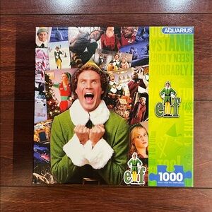 PREOWNED 1000 Piece Puzzle Elf Movie Christmas 19x27 Inches Aquarius No Poster